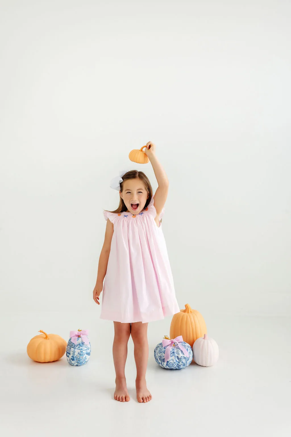 Angel Sleeve Sandy Smocked Dress - Palm Beach Pink with Pumpkin & Bow Smocking